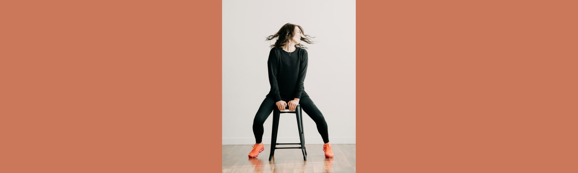 Person on stool doing yoga stretch