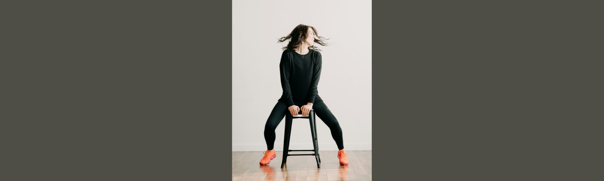 Person on stool doing yoga stretch