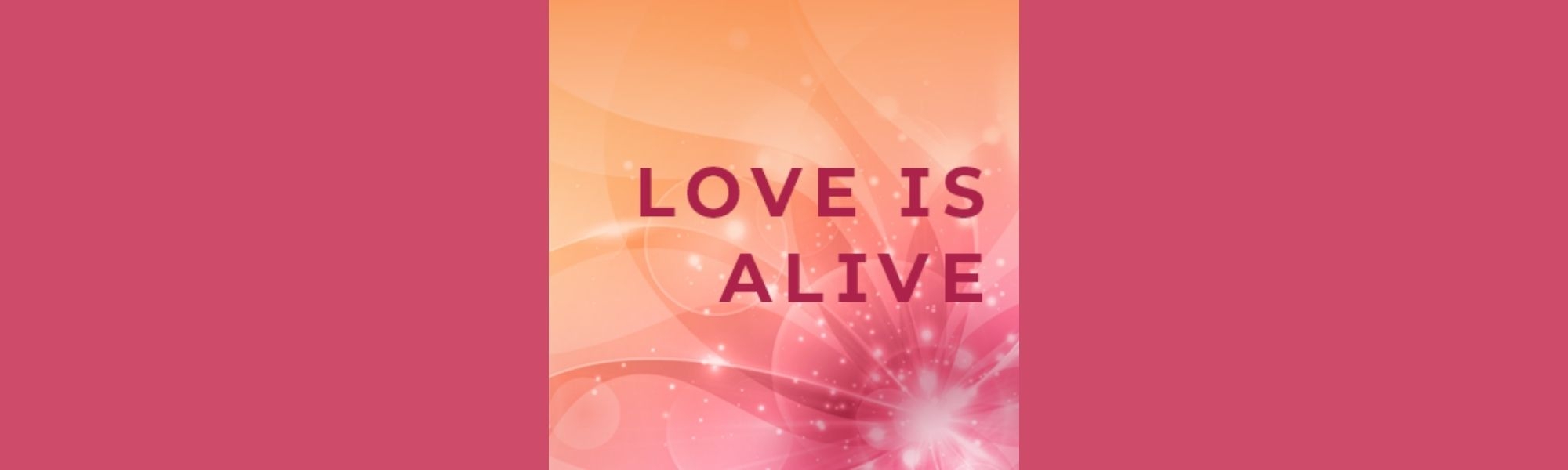 Words "Love Is Alive" on soft background