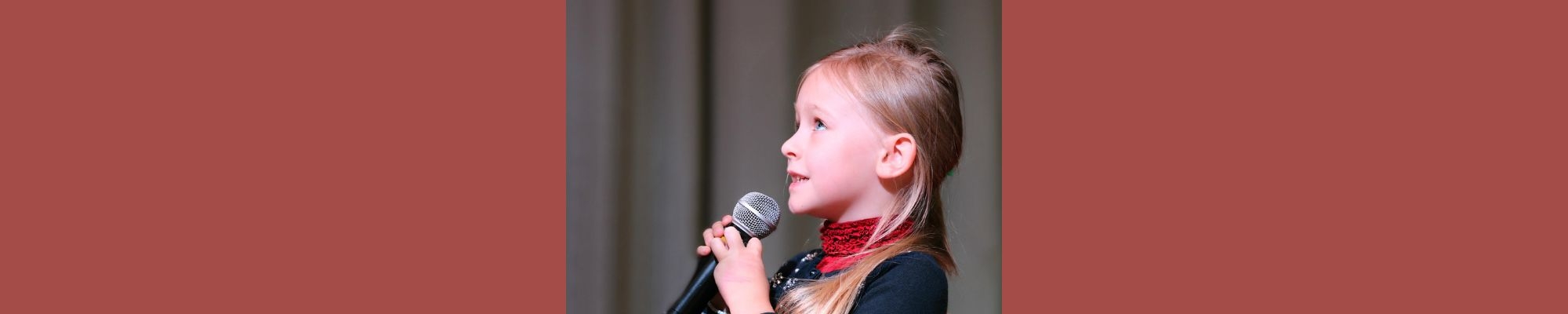 Little girl with microphone