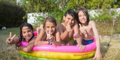 Children in kiddie pool
