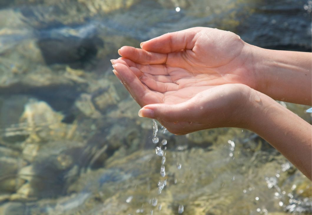 Water flowing through hands